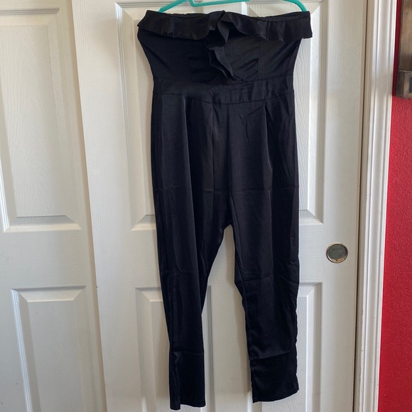 Pants - Black jump cropped jumpsuit with ruffle accent
